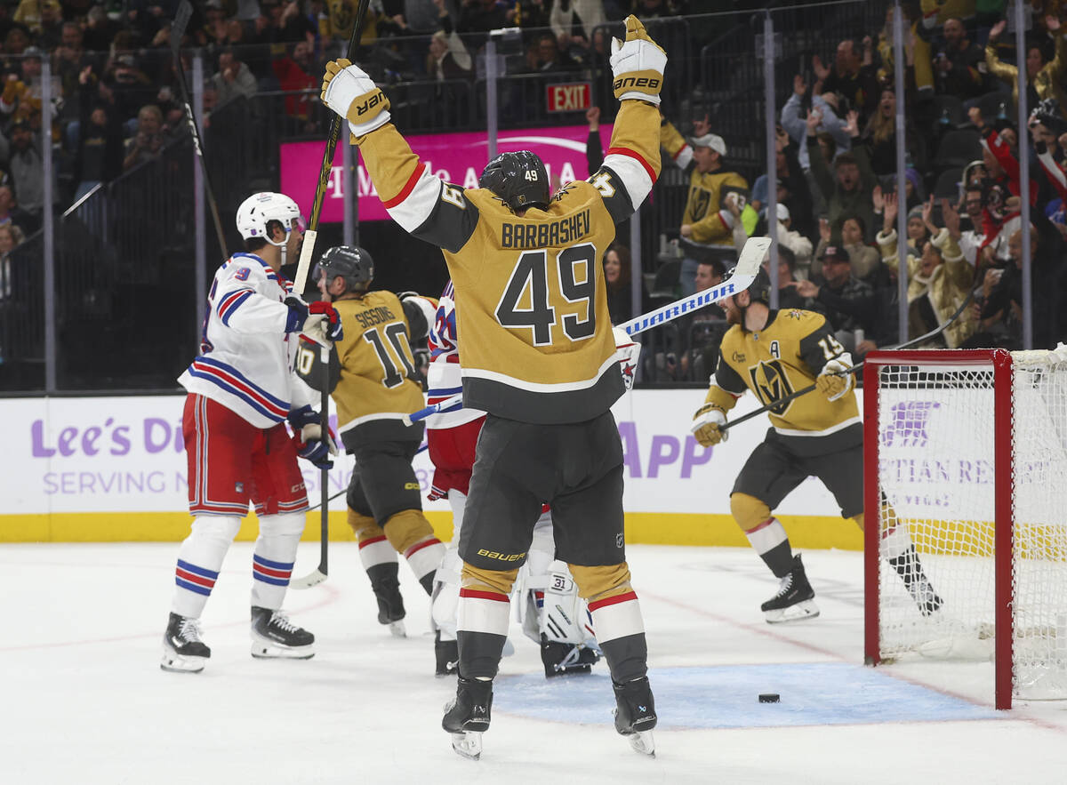 The Golden Knights celebrate a goal against the New York Rangers during the third period of an ...