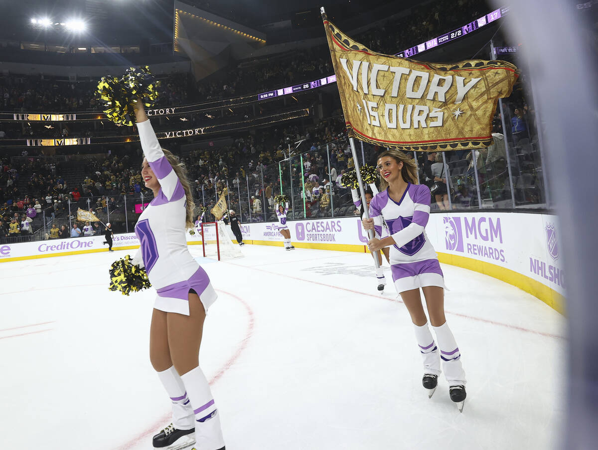 Members of the Golden Knights ice crew celebrate the team’s victory over the New York Ra ...