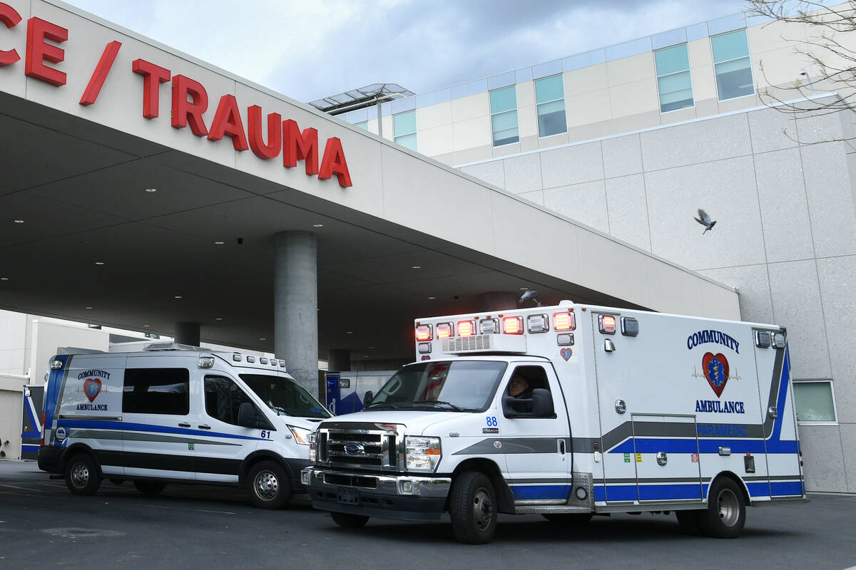 Ambulances are seen outside Sunrise Hospital and Medical Center on Tuesday, November 18, 2025 i ...
