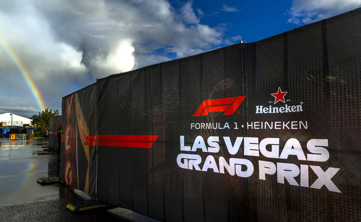 A rainbow emerges in the sky near entry 3 to the F1 Pit Building after a rainstorm passes throu ...