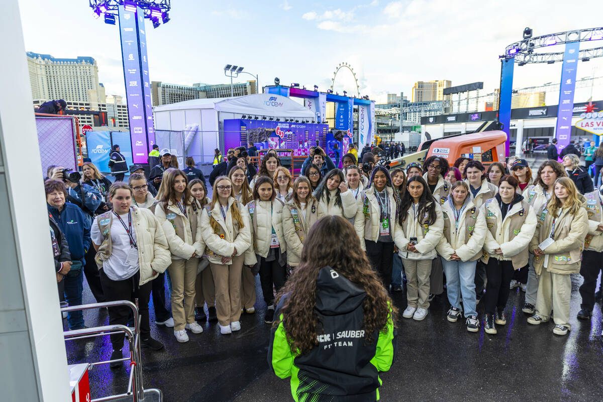 A group from the Girl Scouts of Southern Nevada hear from F1 Academy race car driver Emma Felbe ...