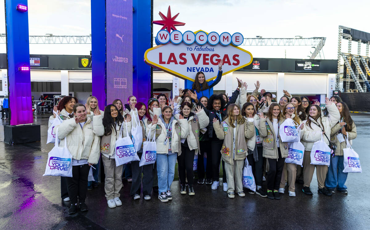 A group from the Girl Scouts of Southern Nevada stand with F1 Academy race driver Nina Gademan ...