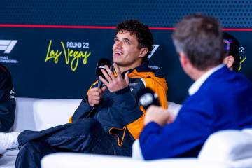 McLaren F1 Team driver Lando Norris answers a question during a press conference at the Las Veg ...