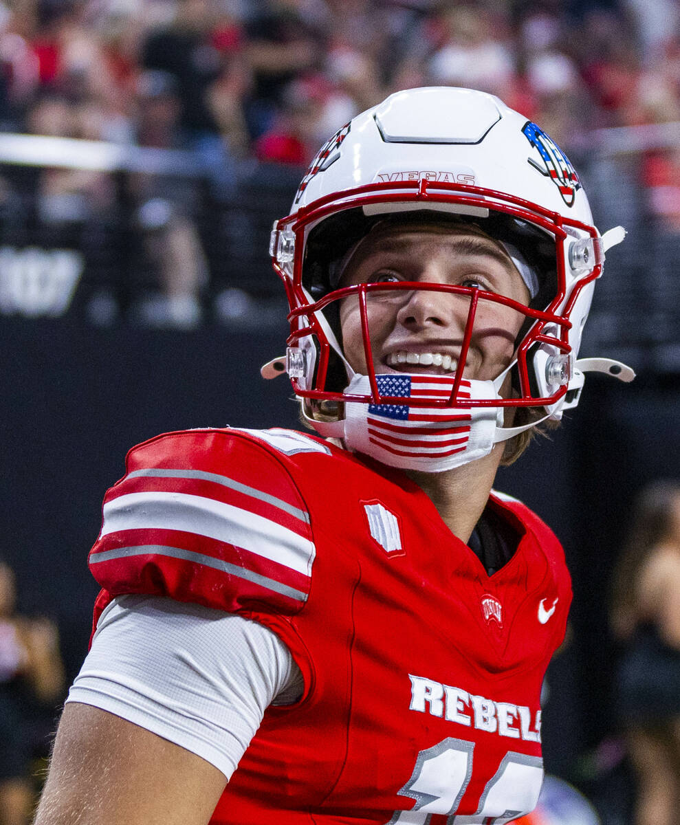UNLV quarterback Anthony Colandrea (10) looks to the fans after another score against the Utah ...