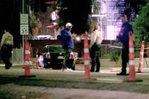 Las Vegas police investigate the scene of an accident where an 11-year-old girl was struck and ...