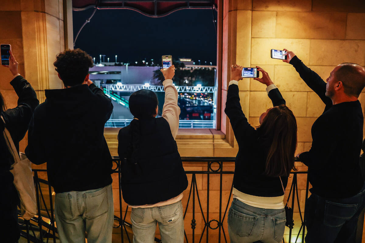 Formula One fans take videos from the Venetian during qualifying for the Las Vegas Grand Prix o ...