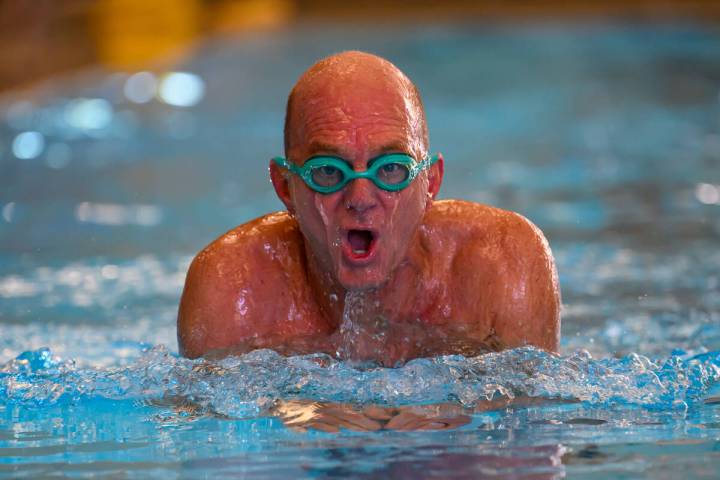 Former Olympic swimmer Rowdy Gaines swims, Tuesday, Nov 11, 2025 at a pool in Salt Lake City. ( ...