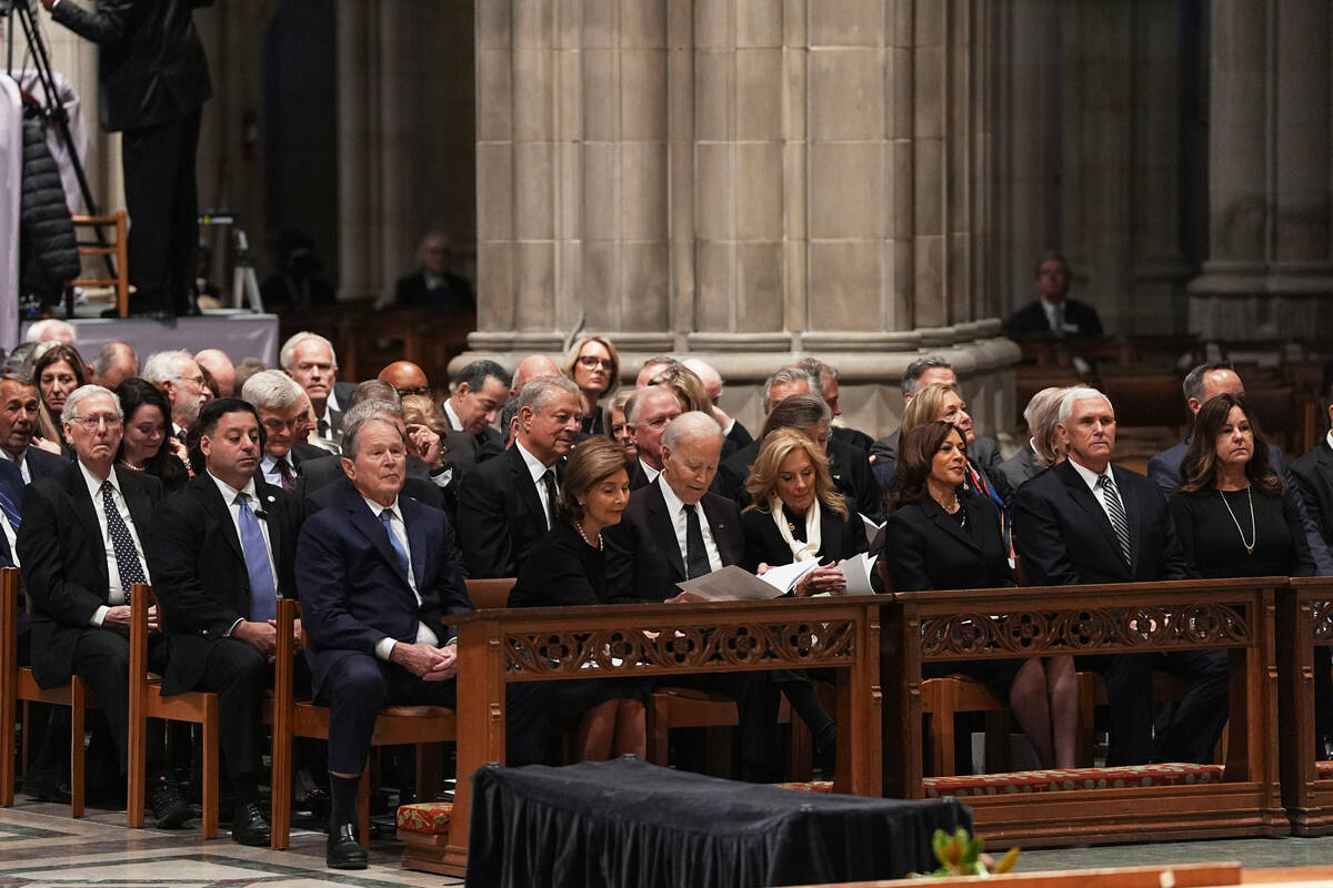 Former Presidents front row from left, George W. Bush with Laura Bush, Joe Biden with Jill Bide ...