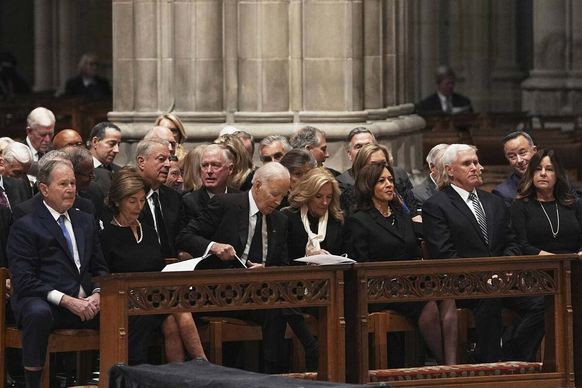 Former Presidents front row from left, George W. Bush with Laura Bush, Joe Biden with Jill Bide ...