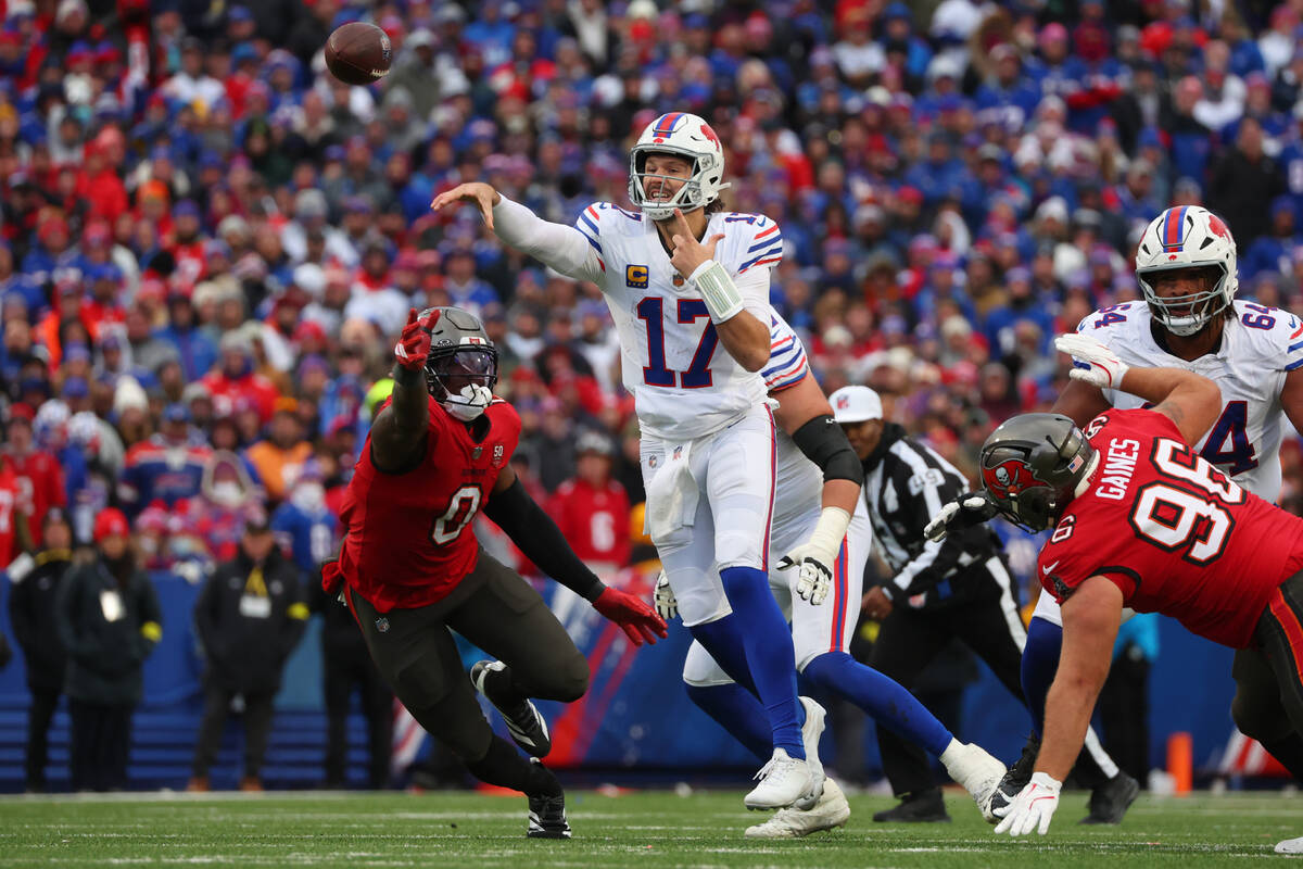 Buffalo Bills quarterback Josh Allen (17) throws a pass during the second half of an NFL footba ...