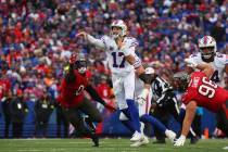 Buffalo Bills quarterback Josh Allen (17) throws a pass during the second half of an NFL footba ...