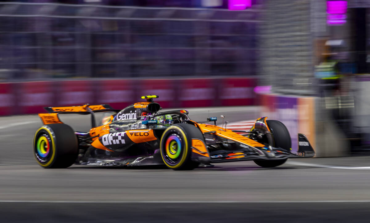 McLaren driver Lando Norris (4) heads into the curves about the Sphere during the first practic ...