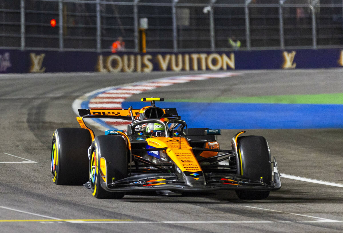 McLaren driver Lando Norris (4) navigates the final turn during the second practice round at th ...