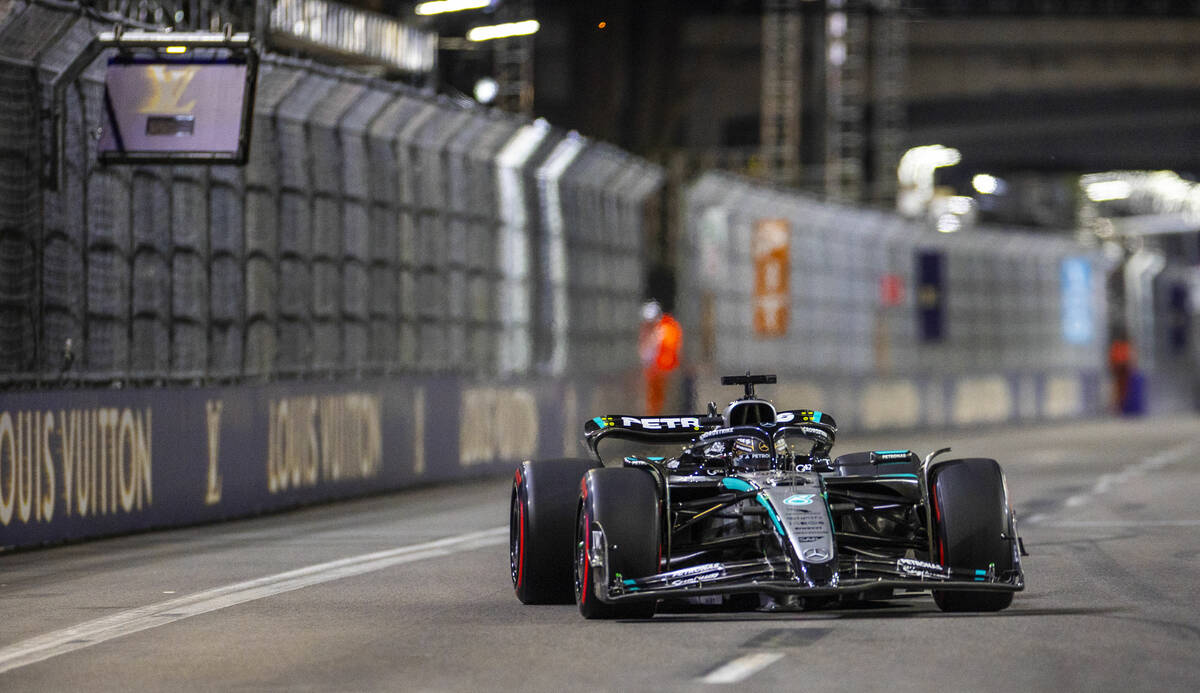 Mercedes driver George Russell (63) navigates the final turn during the second practice round a ...