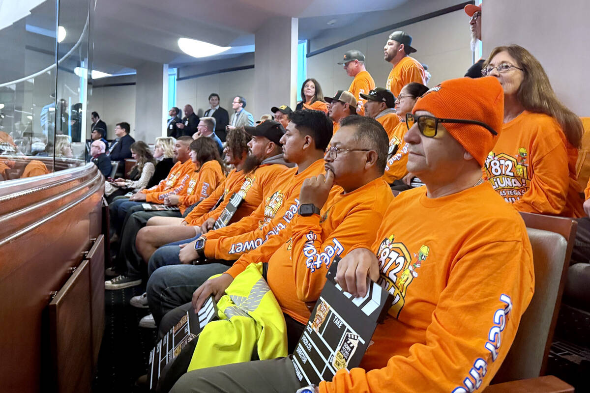 Members of Laborers Local 872 watch as the Nevada Assembly votes on a bill to tie tax breaks to ...