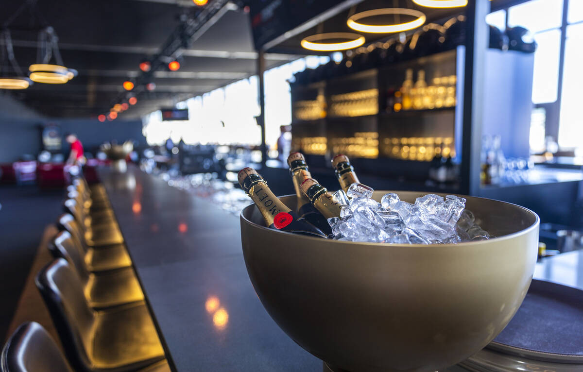 The Trackside Tavern has champagne already on ice during a tour of the Paddock Club within the ...