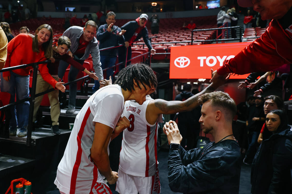 UNLV forward Tyrin Jones (6) yells in celebration on his way to the locker room after the Rebel ...