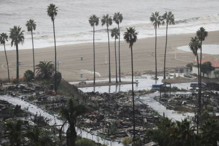 Rain comes down on a neighborhood in the Palisades Fire zone on Tuesday, Oct. 14, 2025, in the ...