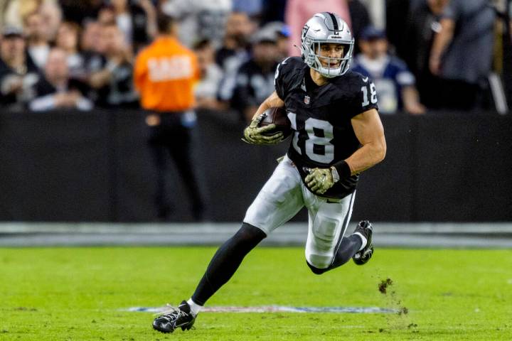 Raiders wide receiver Jack Bech (18) makes a catch during the first half of an NFL game against ...