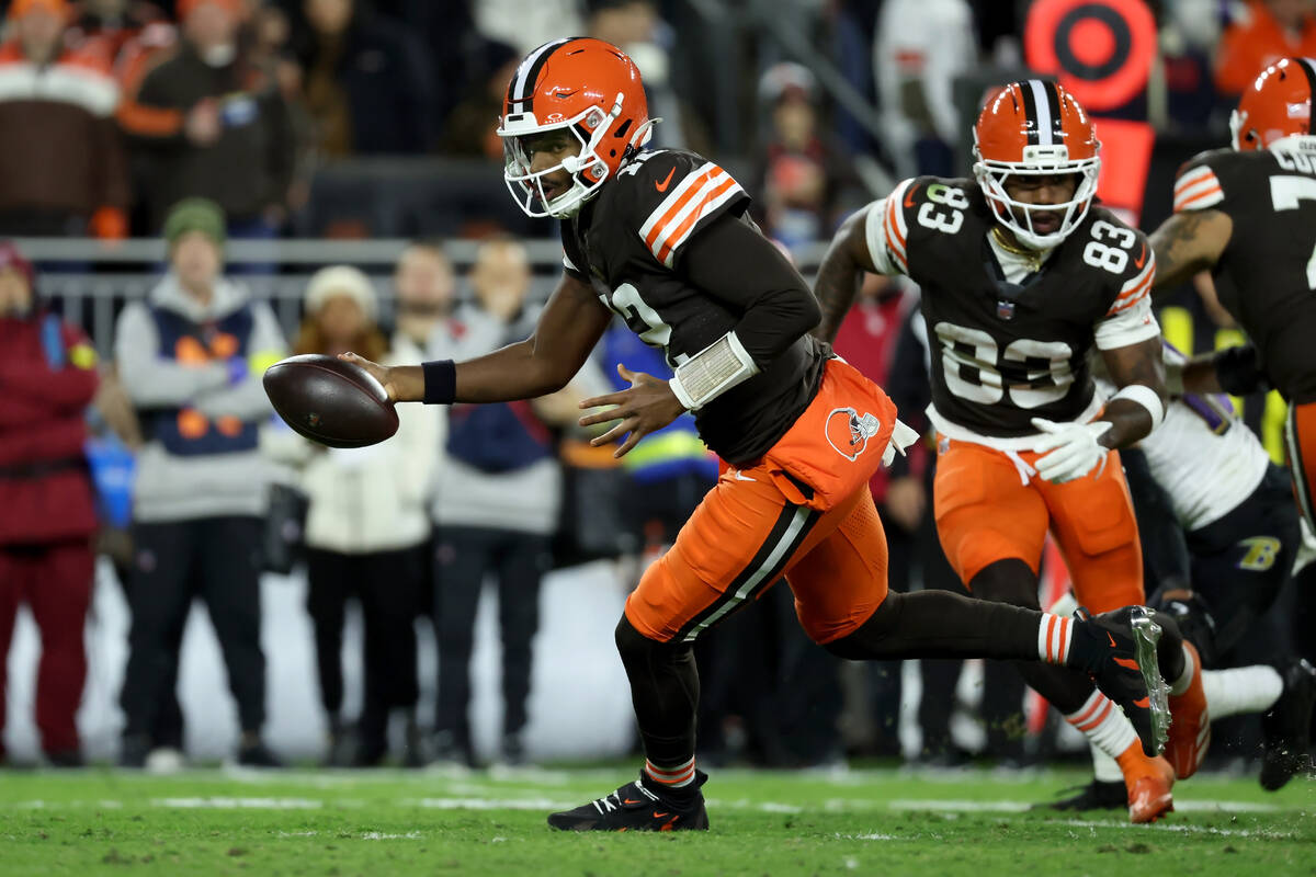 Cleveland Browns quarterback Shedeur Sanders (12) drops back with the ball during an NFL footba ...