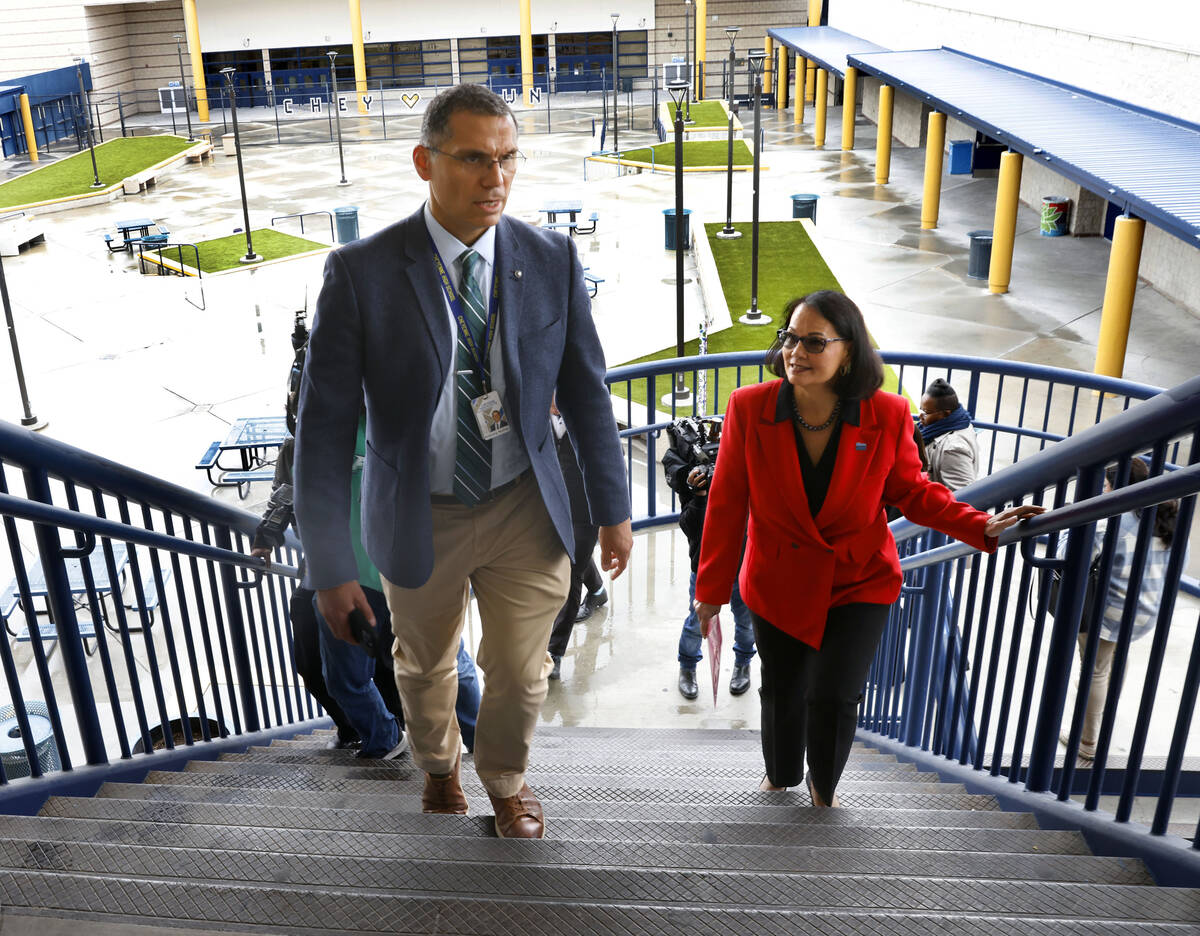 Superintendent Jhone Ebert, right, listens as Cheyenne High School Principal Anthony Nunez lead ...