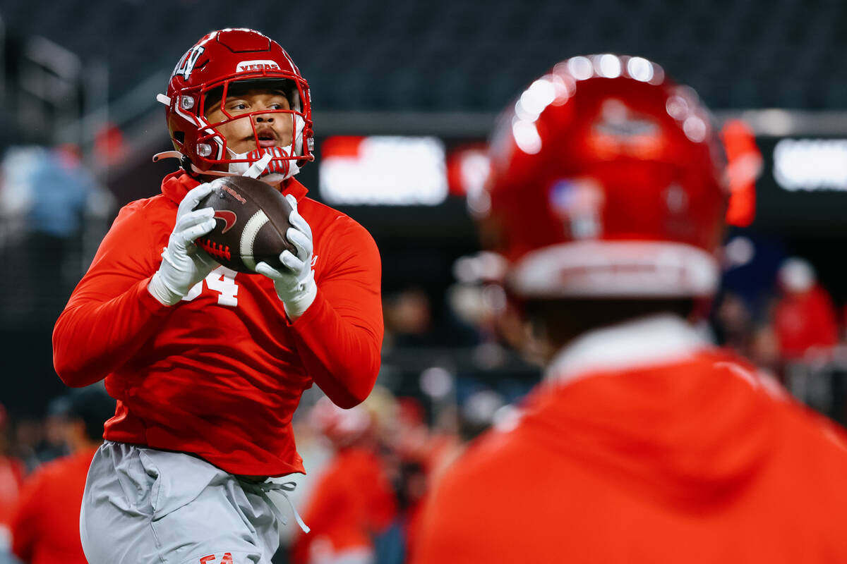UNLV linebacker Isaiah Patterson (54) warms up before the first half of the Ninth Island Showdo ...