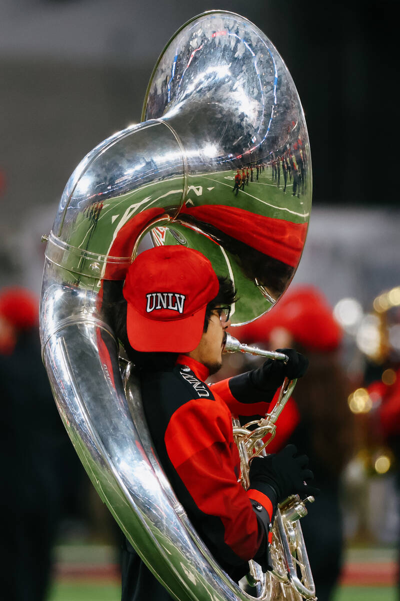 A UNLV marching band member plays an opening performance before the first half of the Ninth Isl ...