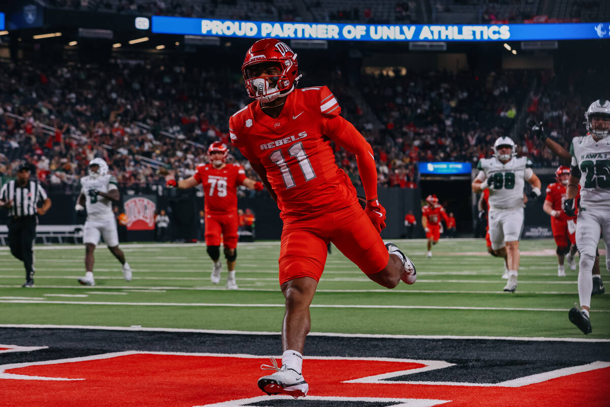 UNLV wide receiver JoJo Earle (11) runs the ball in for a touchdown during the second half of t ...