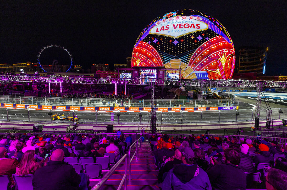 McLaren driver Lando Norris approaches the turns about the Sphere with the "Welcome to Fab ...