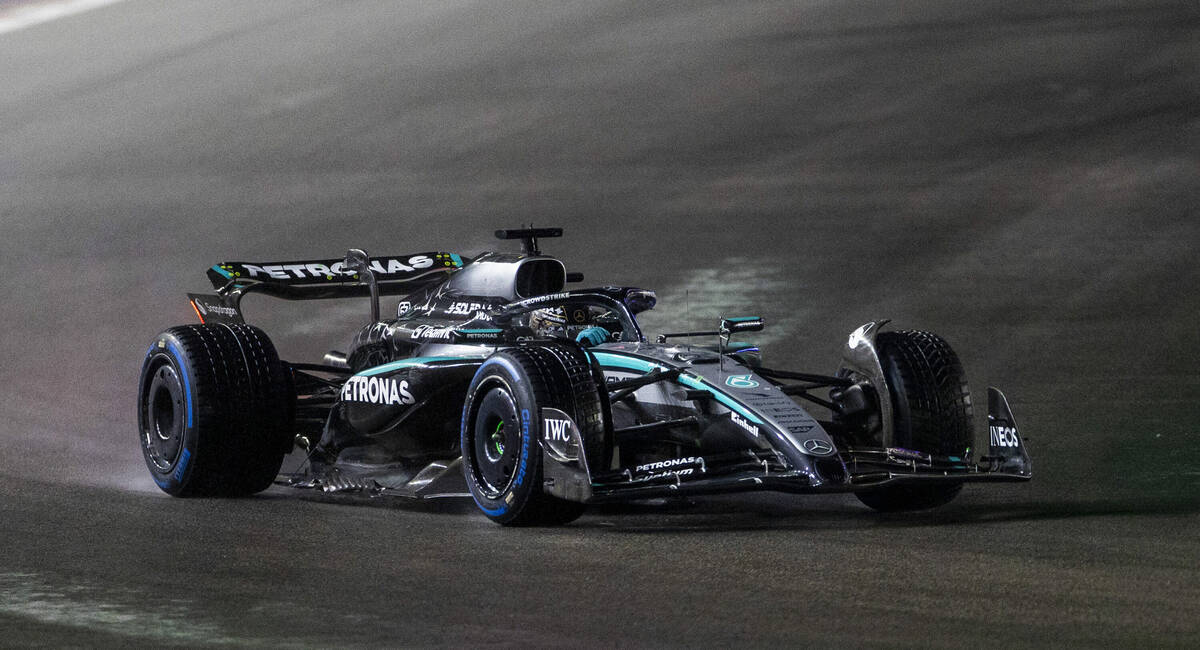 Mercedes driver George Russell (63) navigates turn 1 during the qualifying race at the Las Vega ...