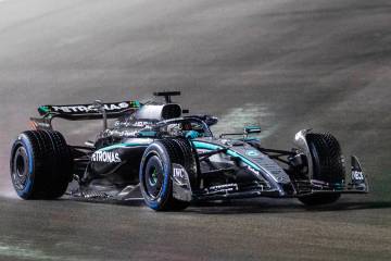 Mercedes driver George Russell (63) navigates turn 1 during the qualifying race at the Las Vega ...