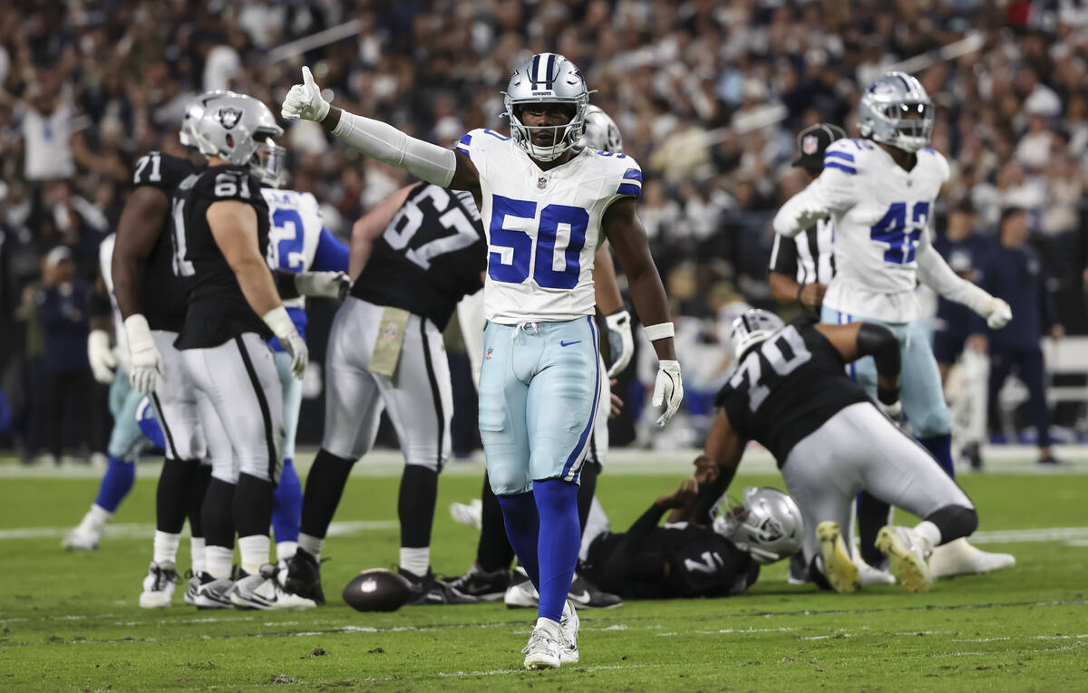Dallas Cowboys linebacker Shemar James (50) reacts after the team sacked Raiders quarterback Ge ...