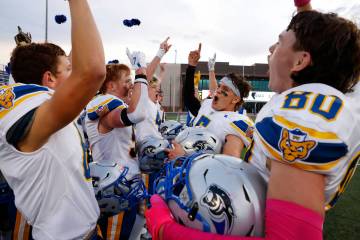 Pahranagat Valley High School players celebrate their 32-6 win against Tonopah during a Class 1 ...