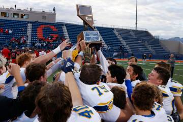 Pahranagat Valley High School players celebrate their 32-6 win against Tonopah during a Class 1 ...