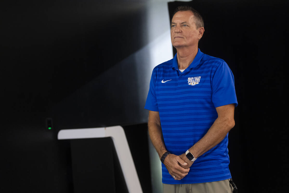 Moapa Valley football head coach Brent Lewis poses for a photo during a preseason meeting and m ...