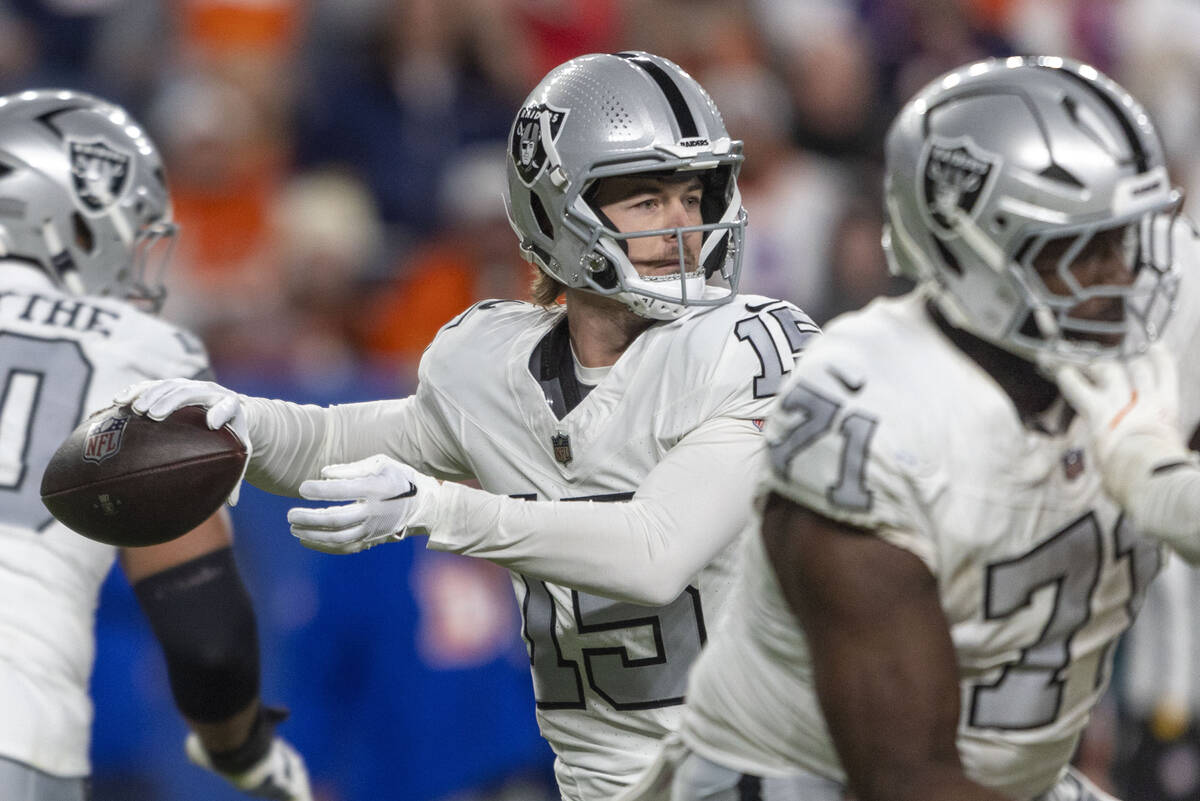 Raiders quarterback Kenny Pickett (15) makes a throw during the second half of an NFL game agai ...