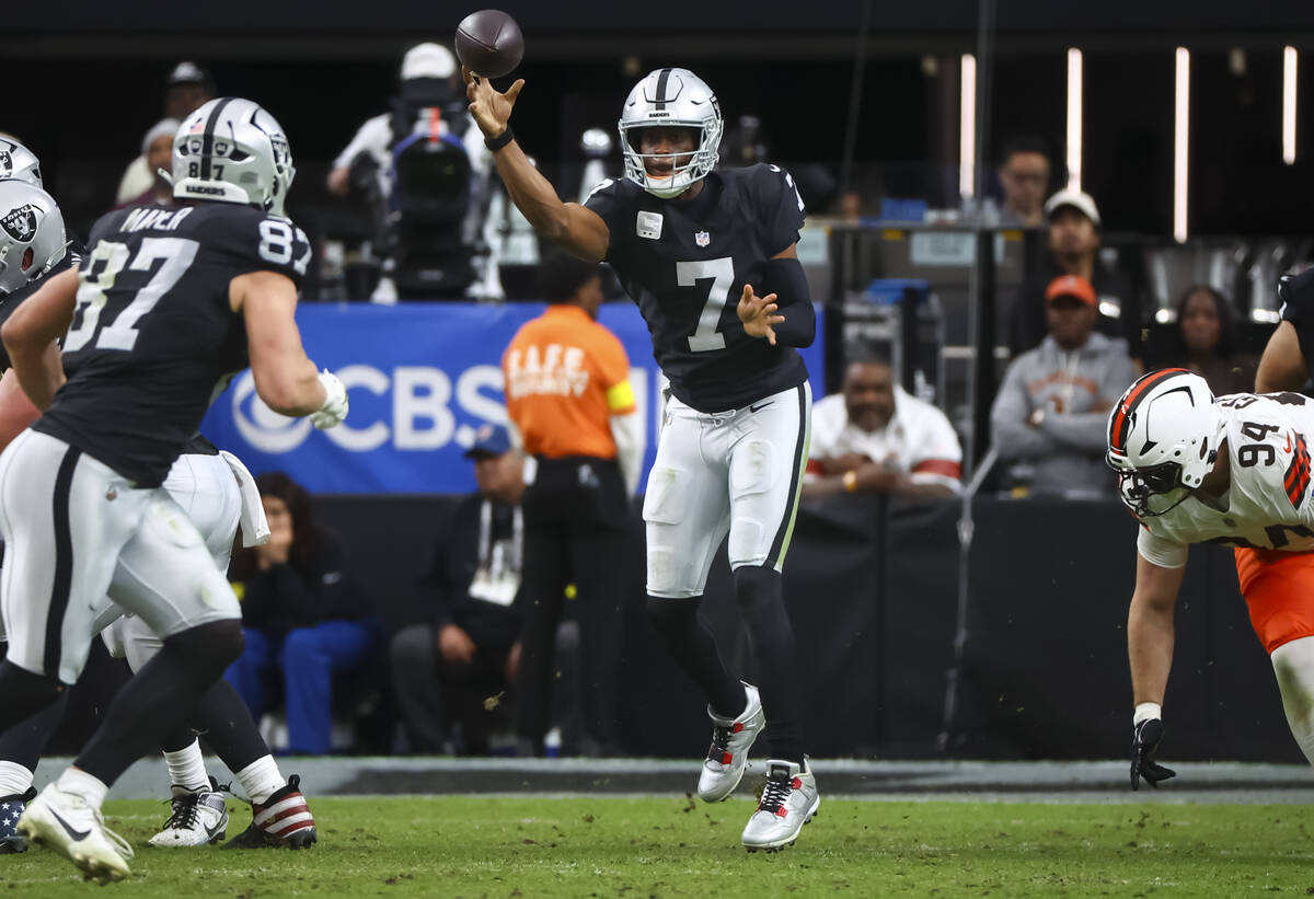 Raiders quarterback Geno Smith (7) throws a pass during the first half of an NFL game against t ...