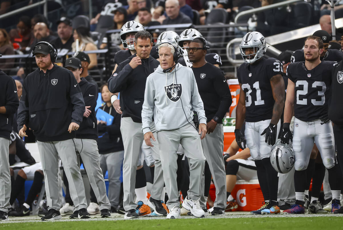 Raiders head coach Pete Carroll looks on during the first half of an NFL game against the Cleve ...