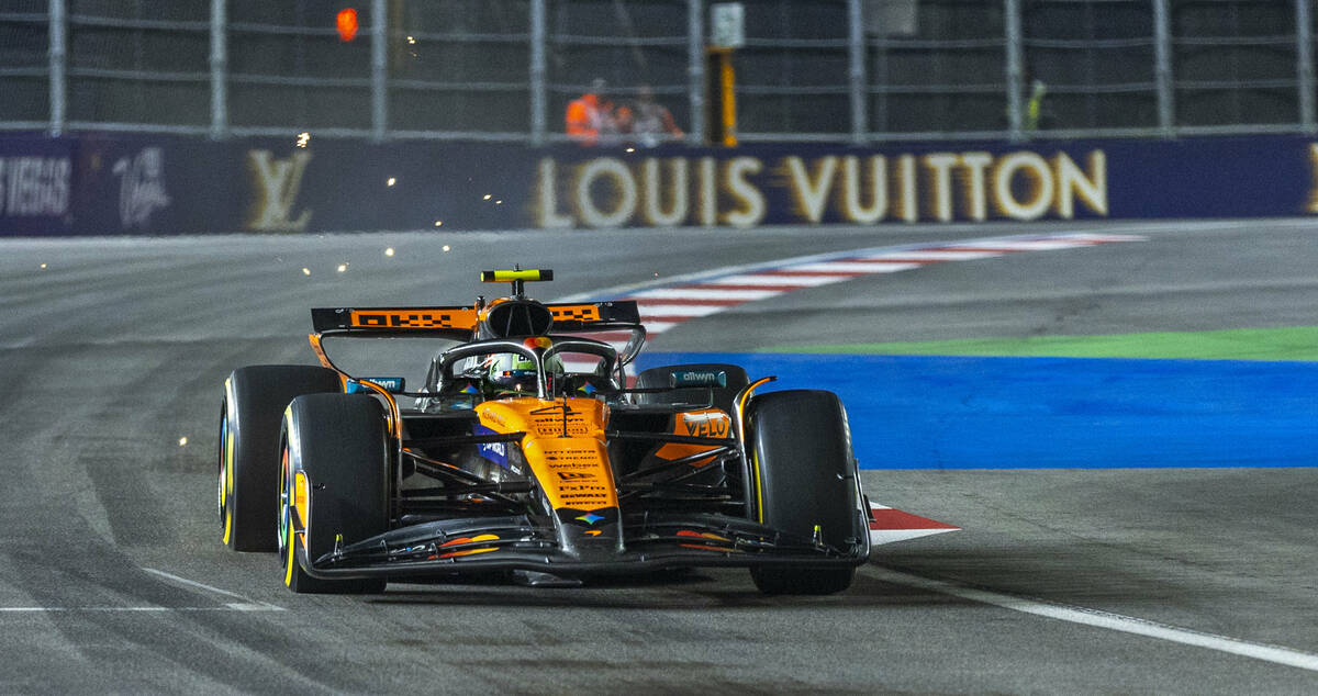 McLaren driver Lando Norris (4) speeds out of the final turn onto the straightaway during the L ...