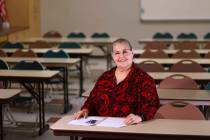 Mayra Crum, who teaches city of Las Vegas citizenship classes at Stupak Community Center, poses ...