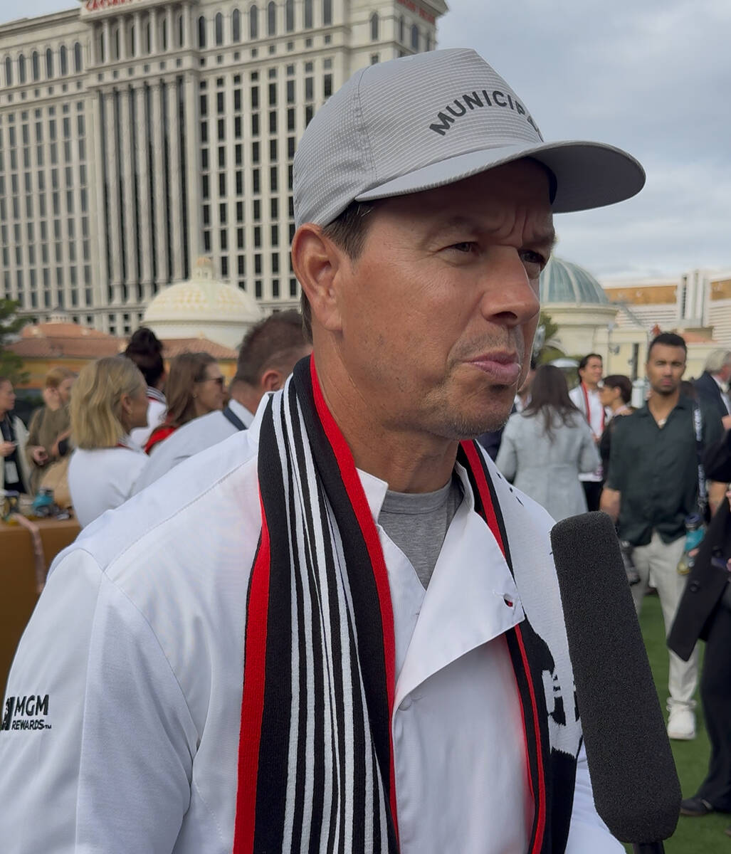 Actor Mark Wahlberg talks to media on the roof of the Bellagio Fountain Club on Saturday, Nov. ...