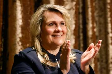 Henderson Councilwoman Carrie Cox applauds as Henderson Mayor Michelle Romero delivers the Stat ...