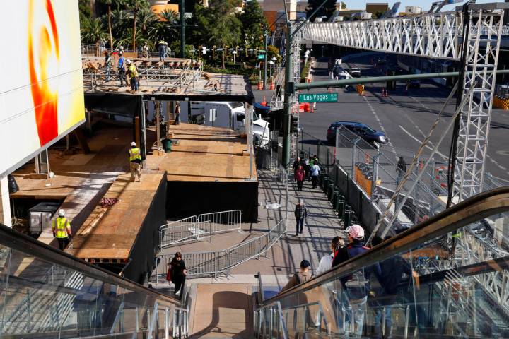 Workers are in the process of dismantling the Formula 1 Grand Prix viewing stages in front of W ...