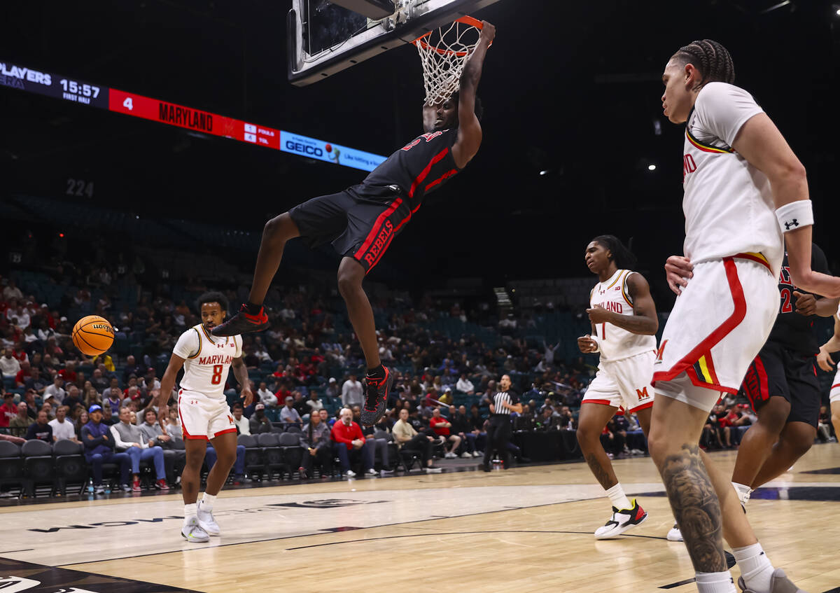 UNLV forward Kimani Hamilton (2) dunks the ball against the Maryland Terrapins during the first ...