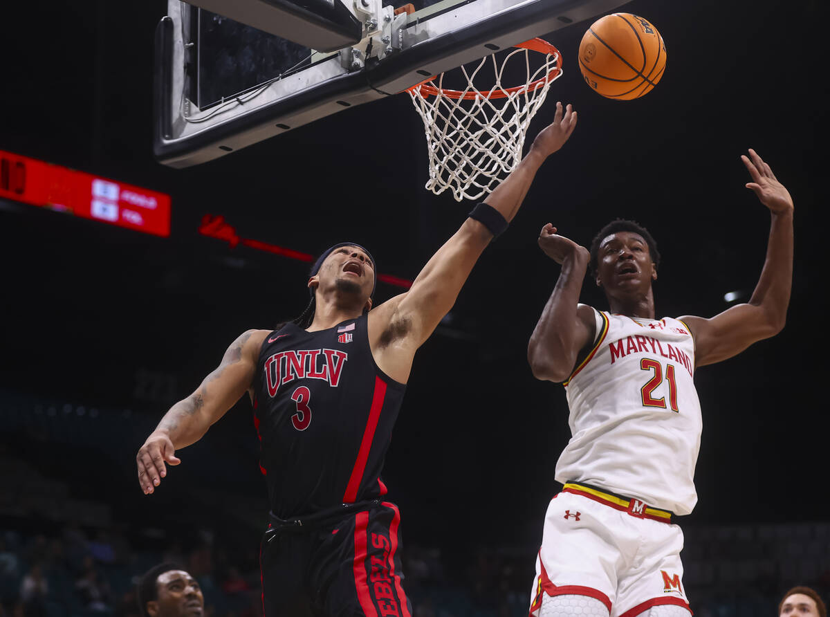 UNLV guard Howie Fleming Jr. (3) lays up the ball as Maryland Terrapins forward Pharrel Payne ( ...