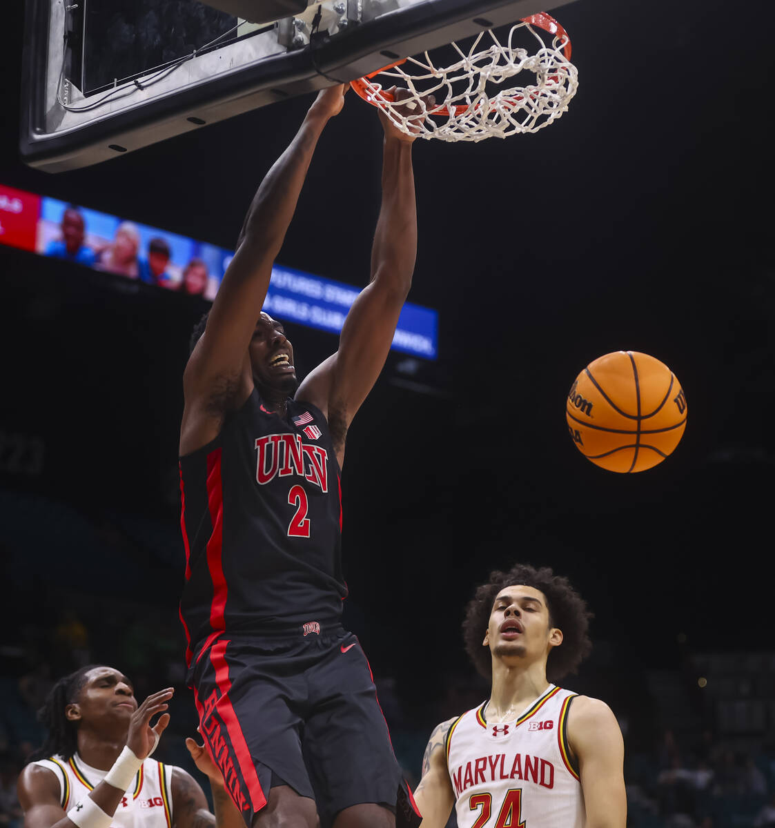 UNLV forward Kimani Hamilton (2) dunks the ball against the Maryland Terrapins during the first ...