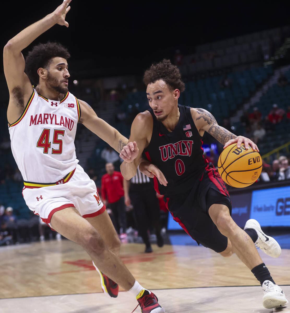 UNLV guard Dravyn Gibbs-Lawhorn (0) drives to the basket against Maryland Terrapins center Coll ...