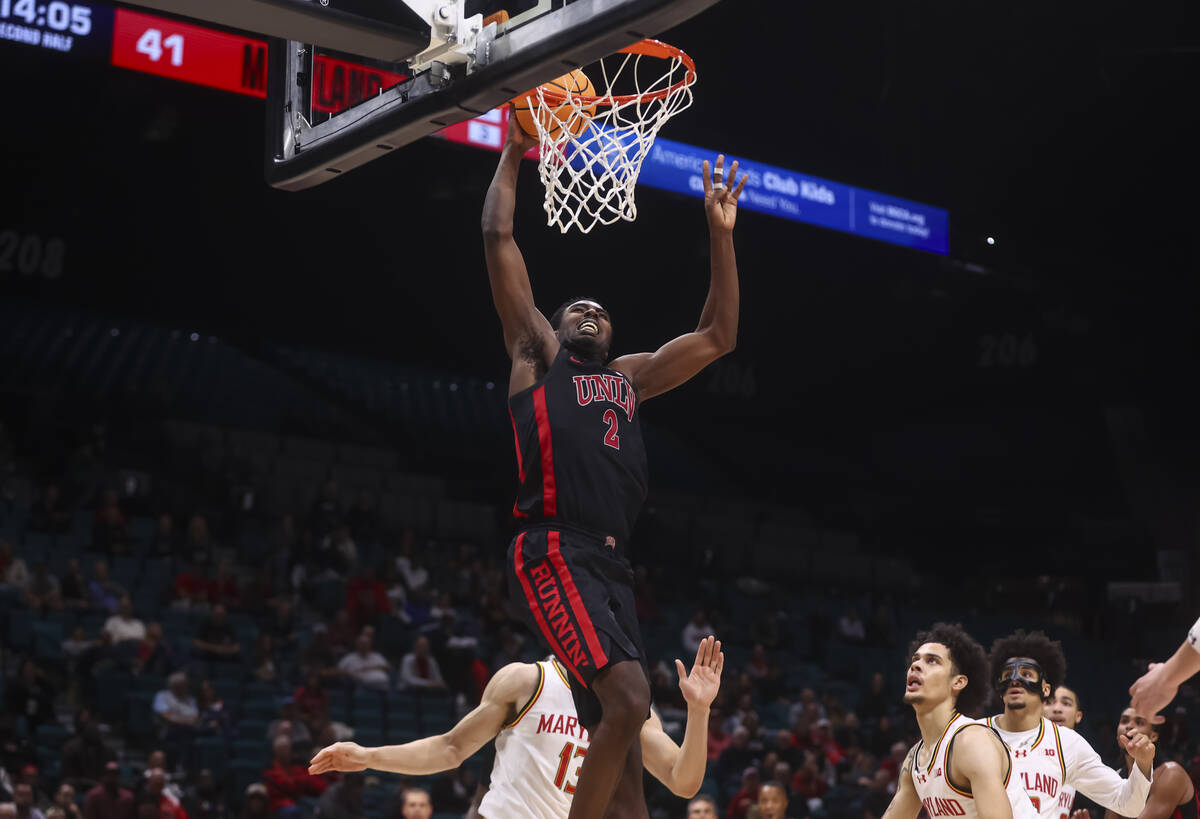 UNLV forward Kimani Hamilton (2) goes to the basket against the Maryland Terrapins during the s ...