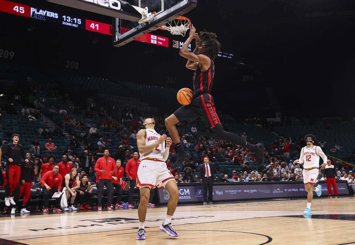 UNLV forward Naas Cunningham (24) dunks the ball against Maryland Terrapins guard Myles Rice (2 ...