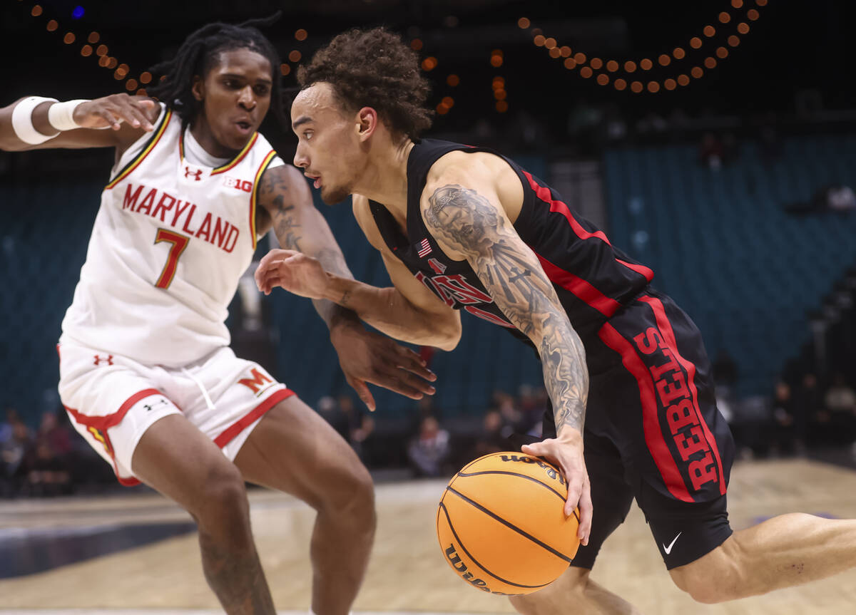 UNLV guard Dravyn Gibbs-Lawhorn (0) drives to the basket against Maryland Terrapins guard Andre ...